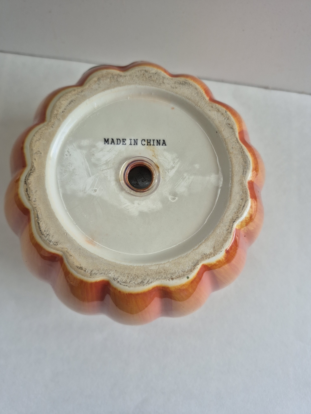 Orange Ceramic Pumpkin Planter with Stopper. Painted Green Leaf - Picture 5 of 6
